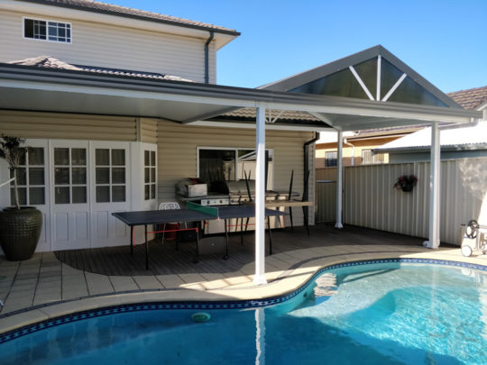 Gable insulated patio roof at Blacktown next to swimming pool