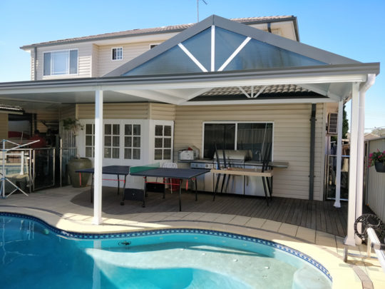Gable insulated patio roof at Blacktown next to swimming pool
